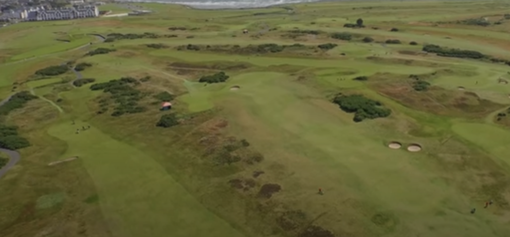 Aerial view of a lush golf course landscape